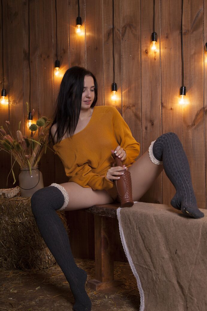 20P Young brunette Susie highlights her tight slit after stripping to OTK socks
