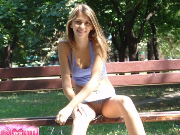 15P Amateur girl partakes in no panty upskirt action in a public park
