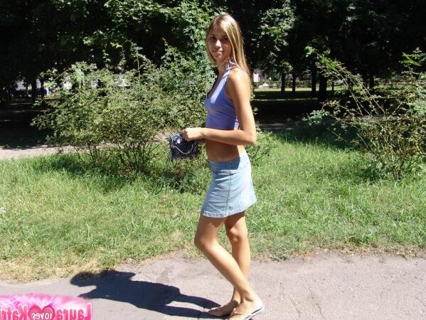 15P Amateur girl partakes in no panty upskirt action in a public park