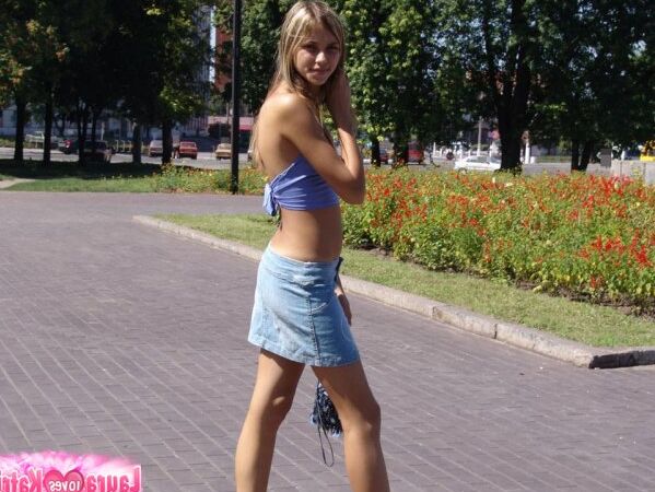15P Amateur girl partakes in no panty upskirt action in a public park