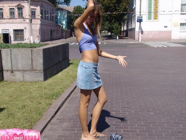 15P Amateur girl partakes in no panty upskirt action in a public park