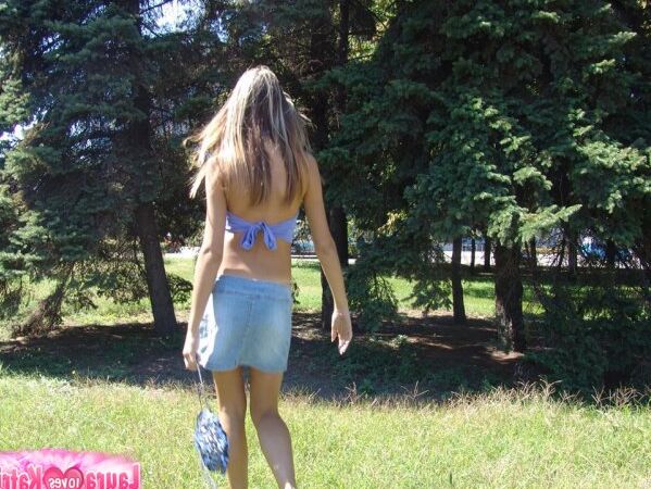 15P Amateur girl partakes in no panty upskirt action in a public park