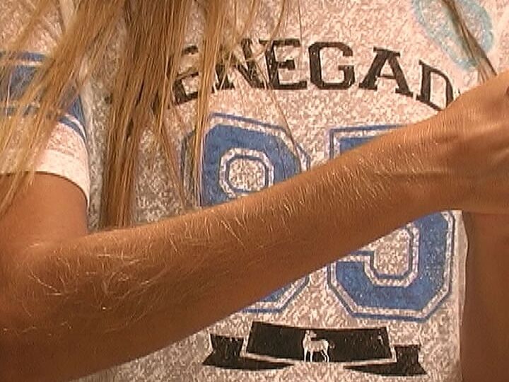 21P MILF Lori Anderson takes care of her hairy arms by applying lotion to them