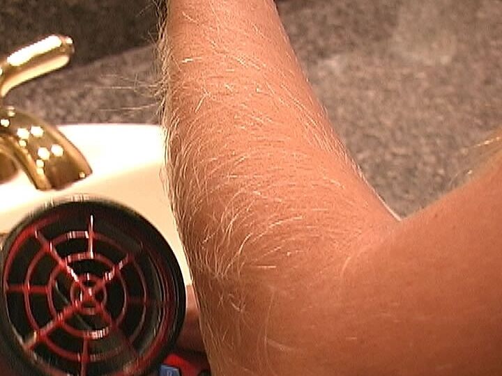 21P MILF Lori Anderson takes care of her hairy arms by applying lotion to them