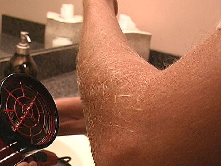 21P MILF Lori Anderson takes care of her hairy arms by applying lotion to them