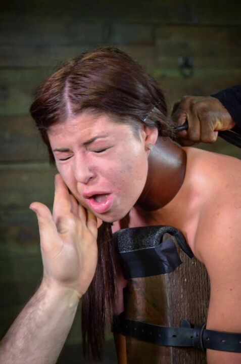 16P Naked female Mia Gold endures hardcore BDSM play in a dungeon