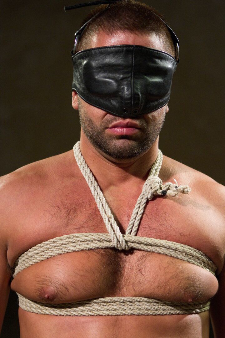 21P Sexy domme in a latex outfit Beretta James abuses a masked slave's cock