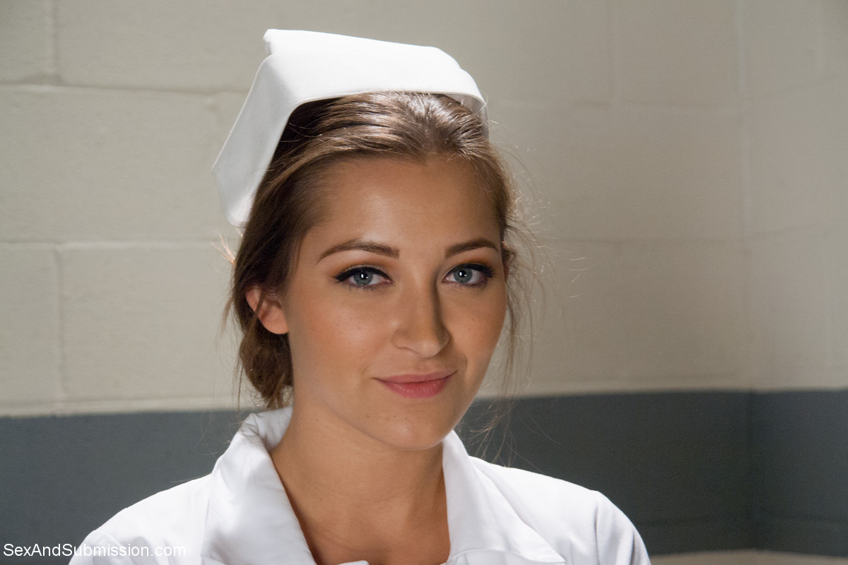 20P Gorgeous nurse with a nice butt Dani Daniels strips and poses in high heels
