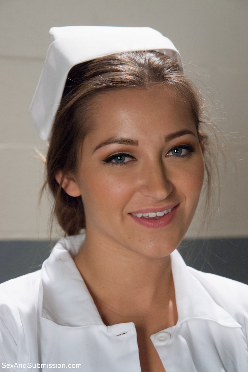 20P Gorgeous nurse with a nice butt Dani Daniels strips and poses in high heels