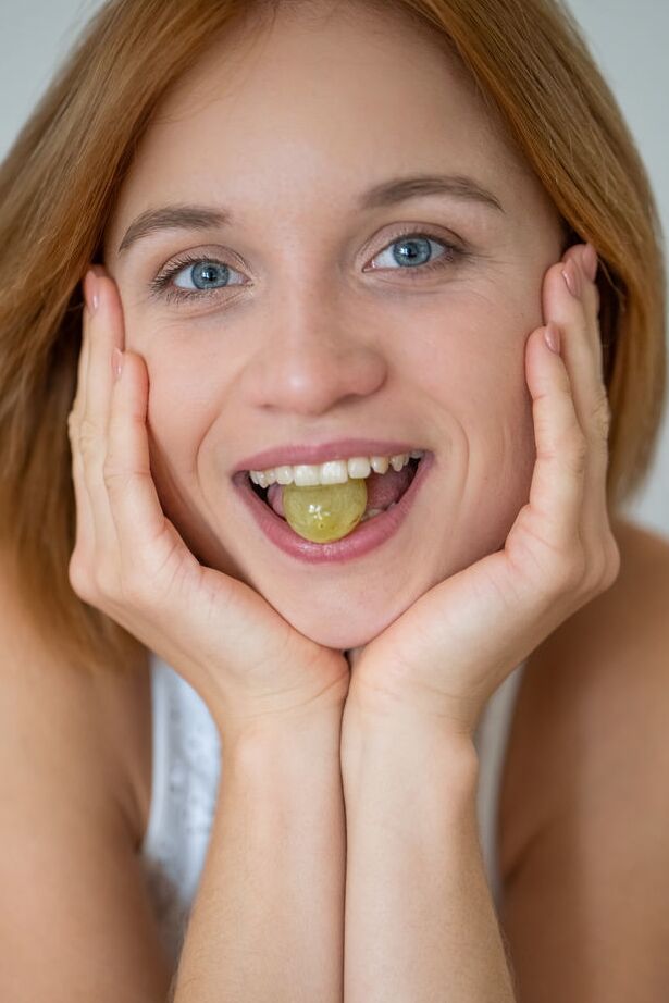 18P Mikavi gets naughty and playfully eat her grapes on the table while showing