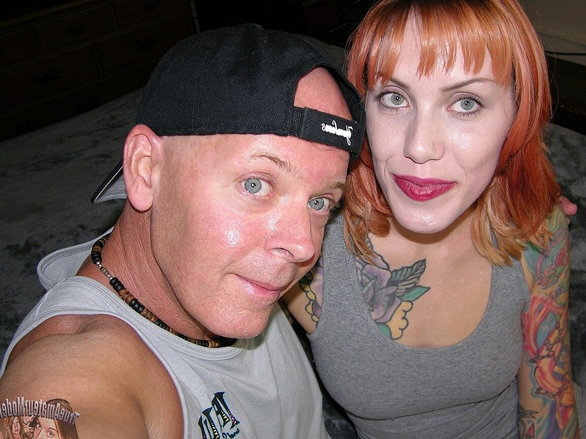 16P Tattooed Metalhead Chick Down On Her Knees Stroking On A Hard Penis And