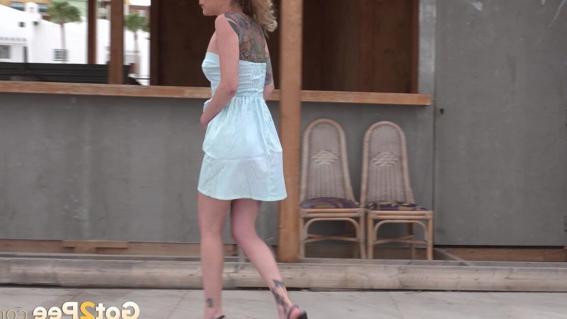 15P Aylin Tattoo squats and pees in public on vacation