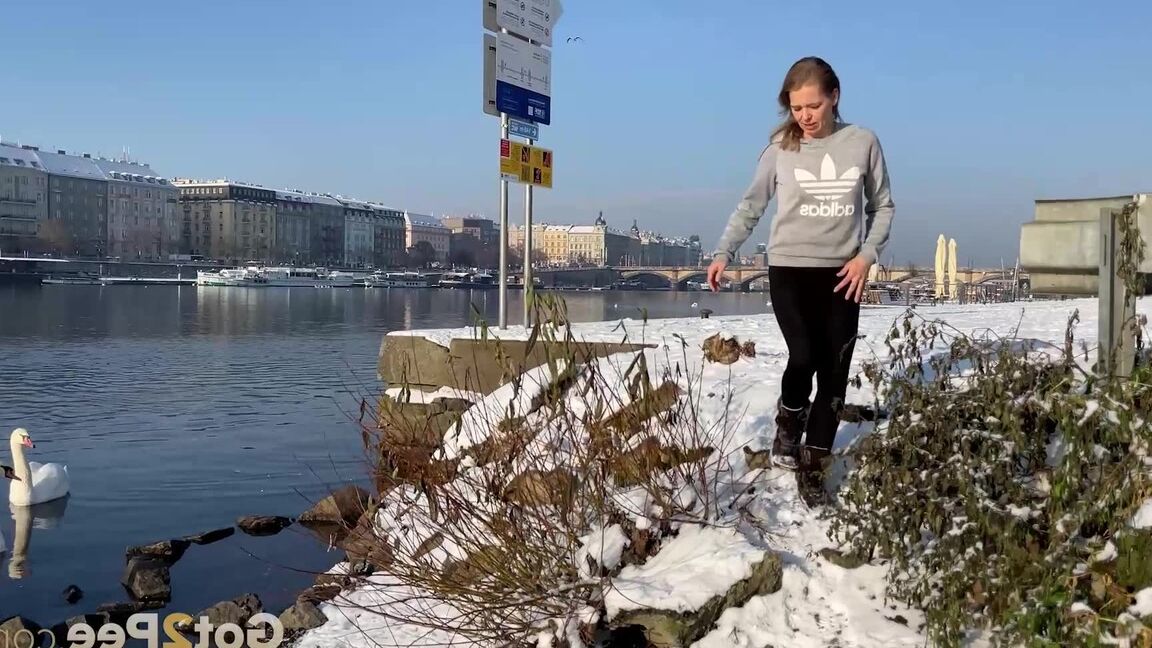 15P European babe squats next to the river to piss
