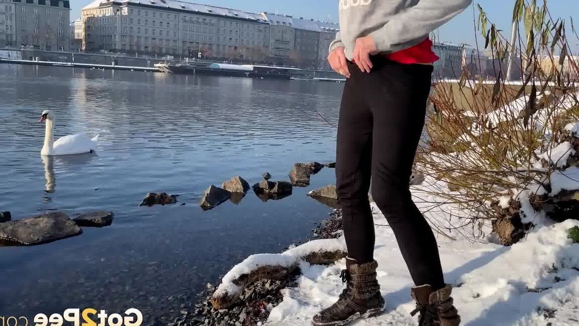 15P European babe squats next to the river to piss