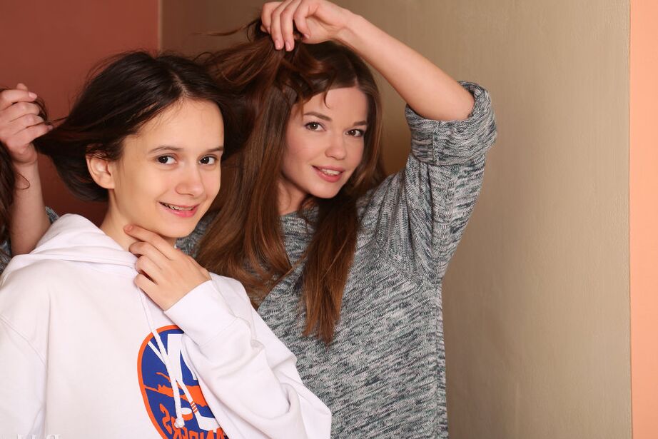 16P Young lesbians Nedda & Eiby Shine get completely naked on a staircase