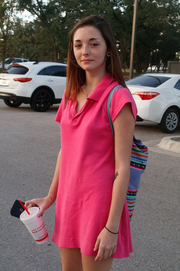 12P Skinny babe Hannah Tarley shows her panties an upskirt at a fast food joint