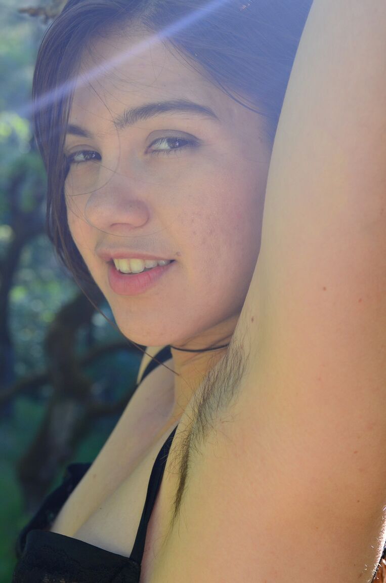 21P Thick beauty Felix strips in nature & flaunts her hairy armpits & crotch