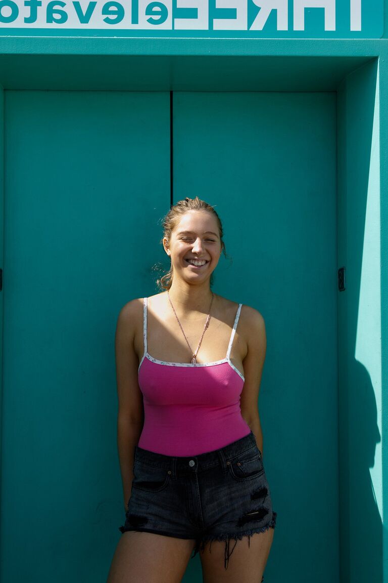 12P Adorable American amateur Maddie Crump flashes her big tit & teases in public