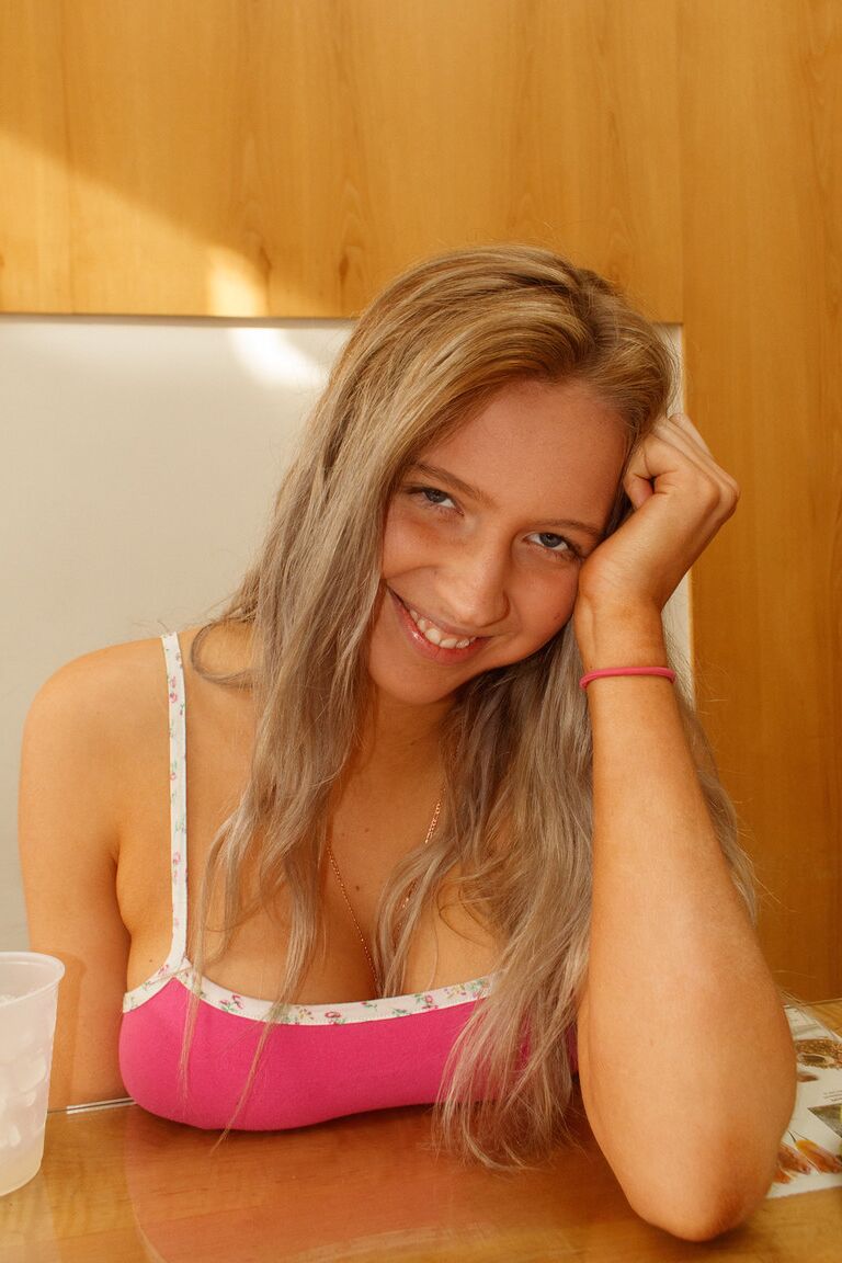 12P Adorable American amateur Maddie Crump flashes her big tit & teases in public
