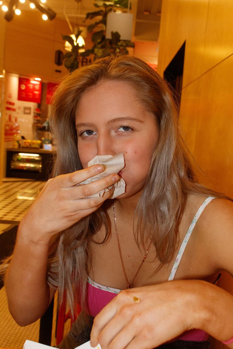12P Adorable American amateur Maddie Crump flashes her big tit & teases in public