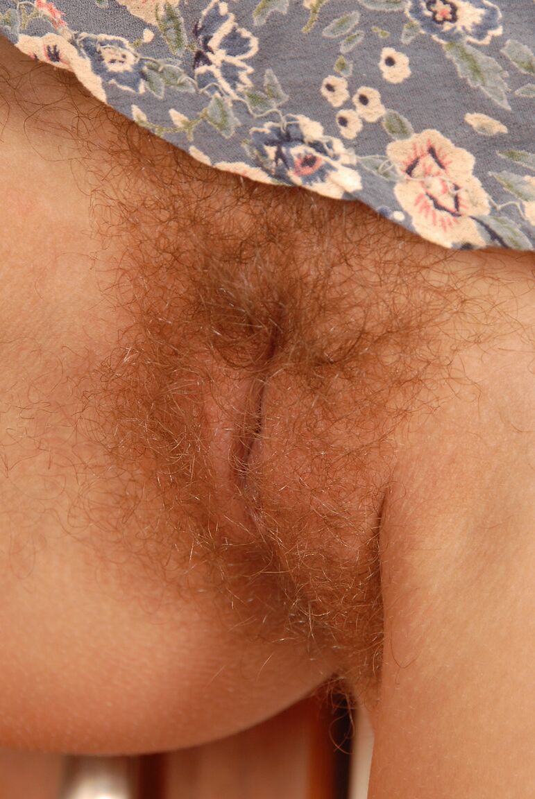 21P Petite blonde Petty shows her hairy pussy up close in sexy kitchen solo