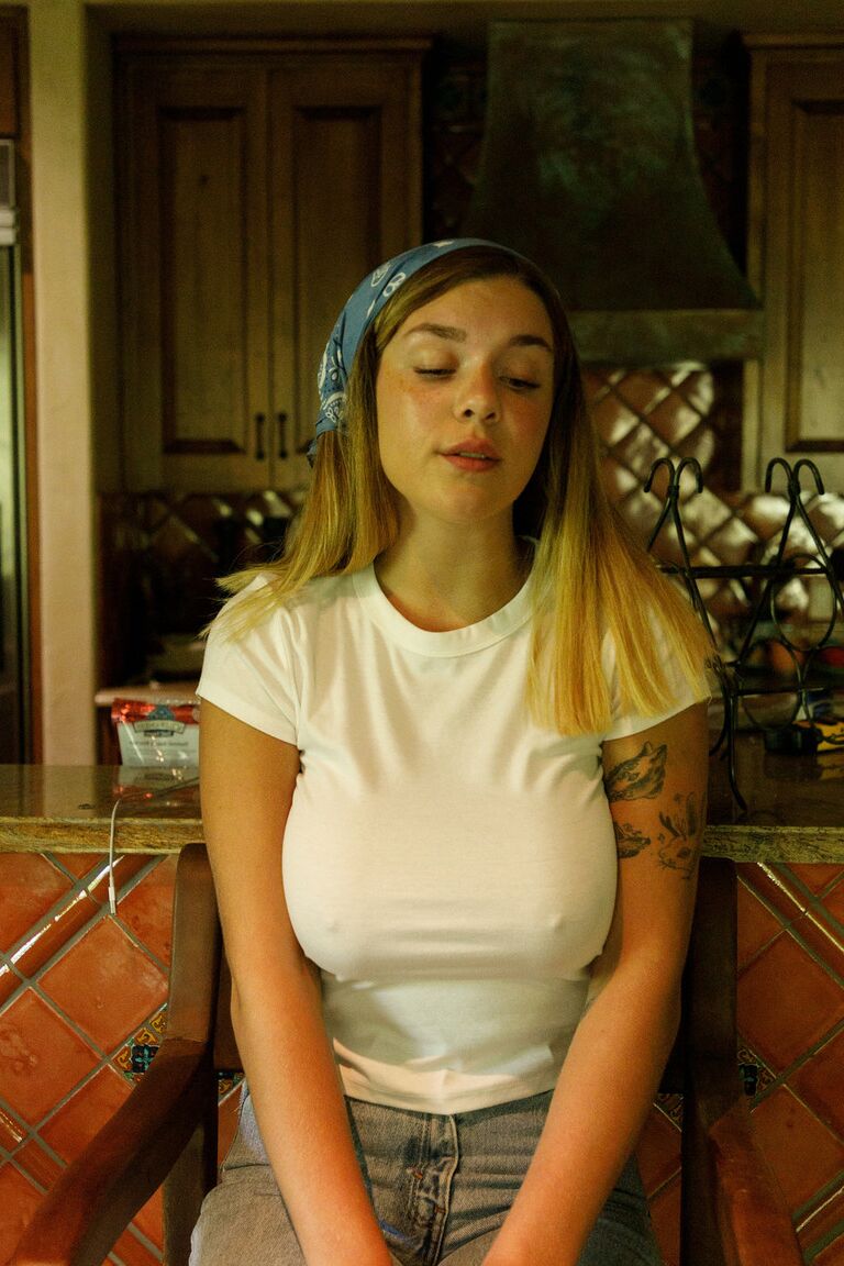 12P Pretty amateur babe Gabbie Carter flashes her big tits in public