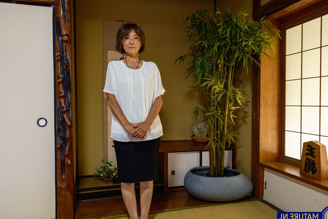 20P Asian granny Asami Fujiwara strips and facesits a guy on the floor