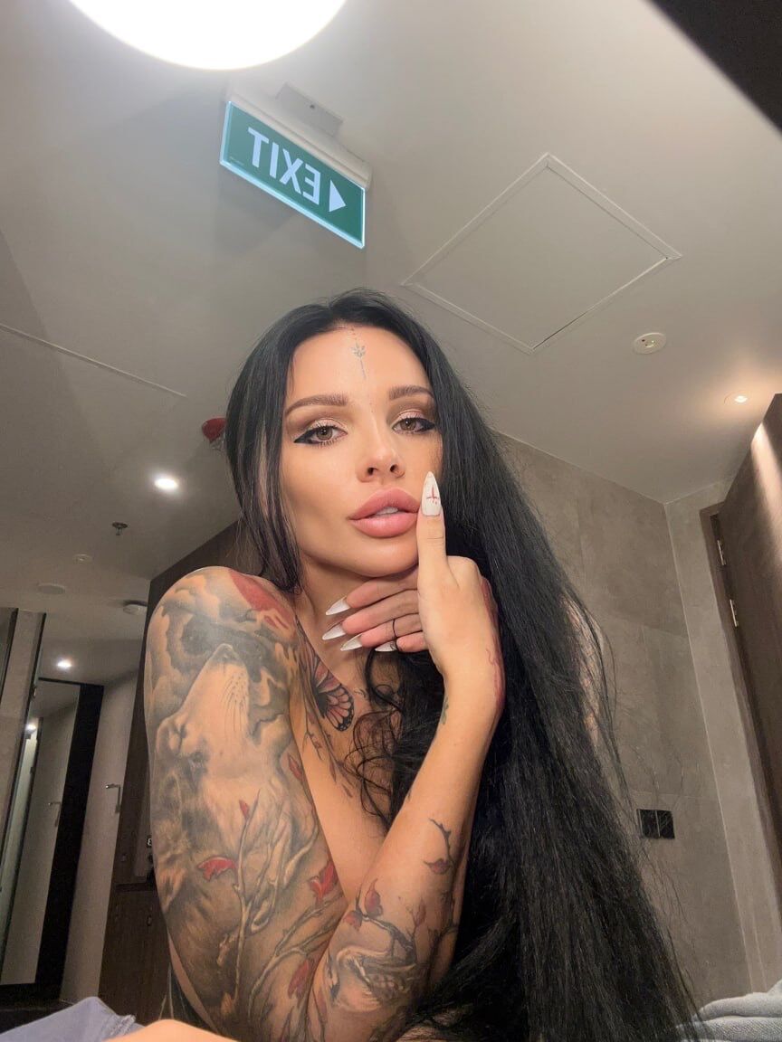 13P Inked OnlyFans model Sunny Free unveils her big tits and ass in a solo