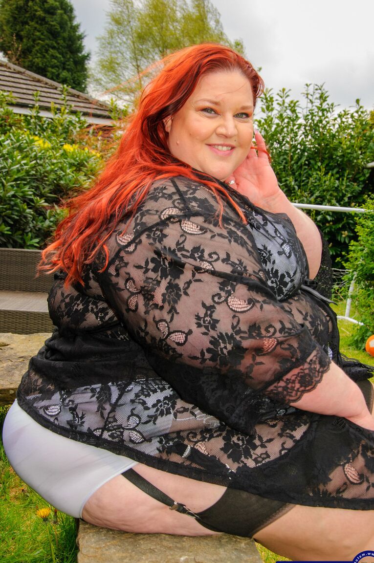 10P Morbidly obese older redhead dildos her snatch in a garter belt and nylons