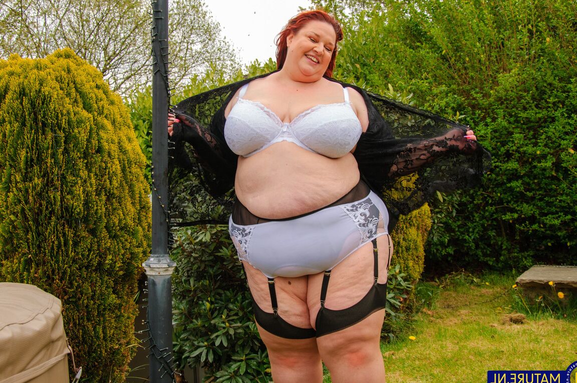10P Morbidly obese older redhead dildos her snatch in a garter belt and nylons