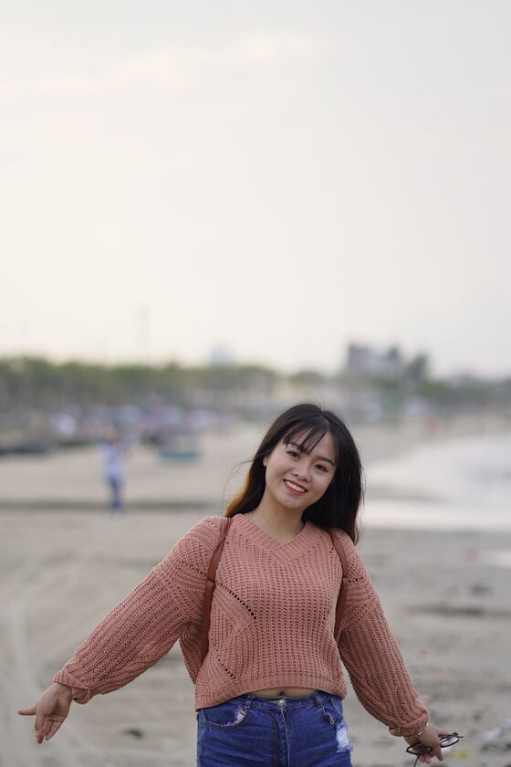 21P Stunning Asian babe poses in her jean shorts & sweater in public