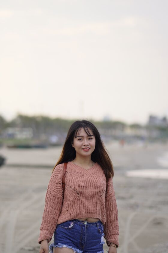21P Stunning Asian babe poses in her jean shorts & sweater in public