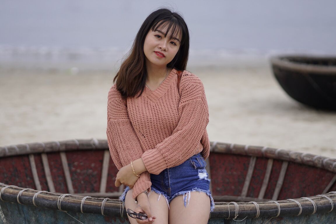 21P Stunning Asian babe poses in her jean shorts & sweater in public