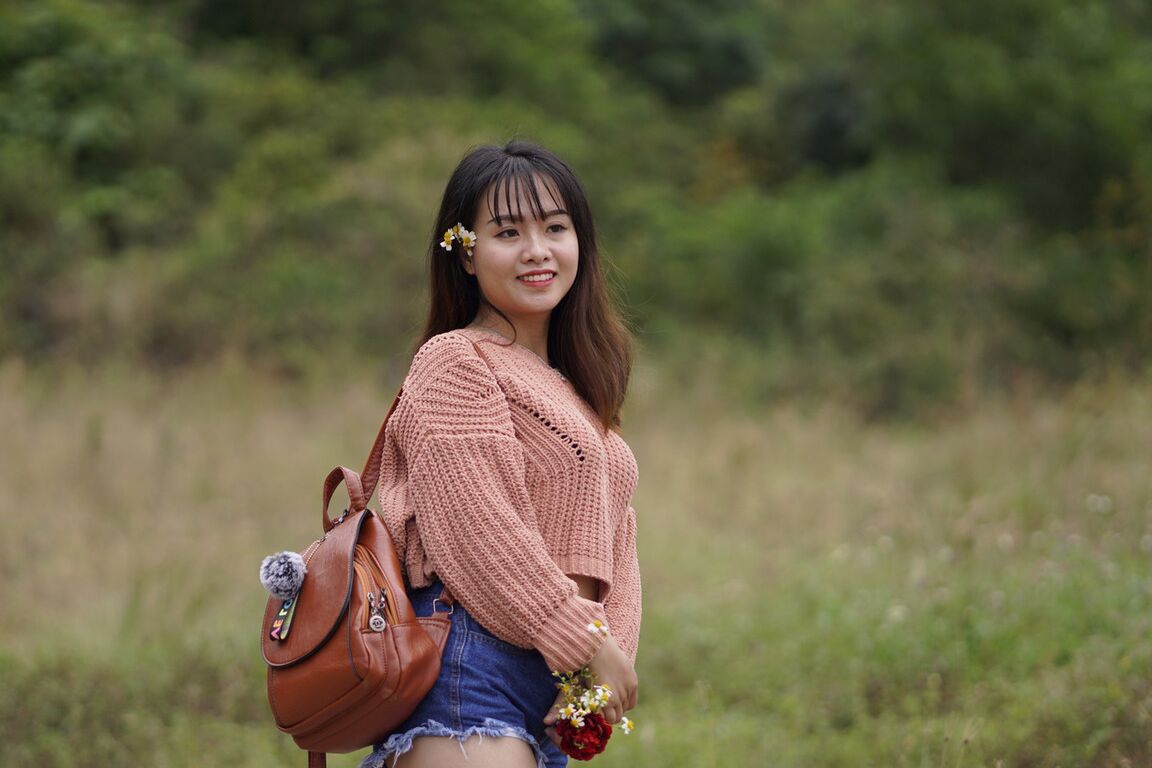 21P Stunning Asian babe poses in her jean shorts & sweater in public