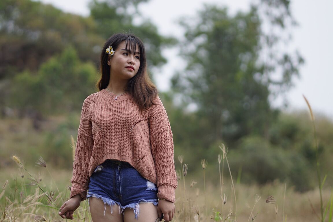 21P Stunning Asian babe poses in her jean shorts & sweater in public