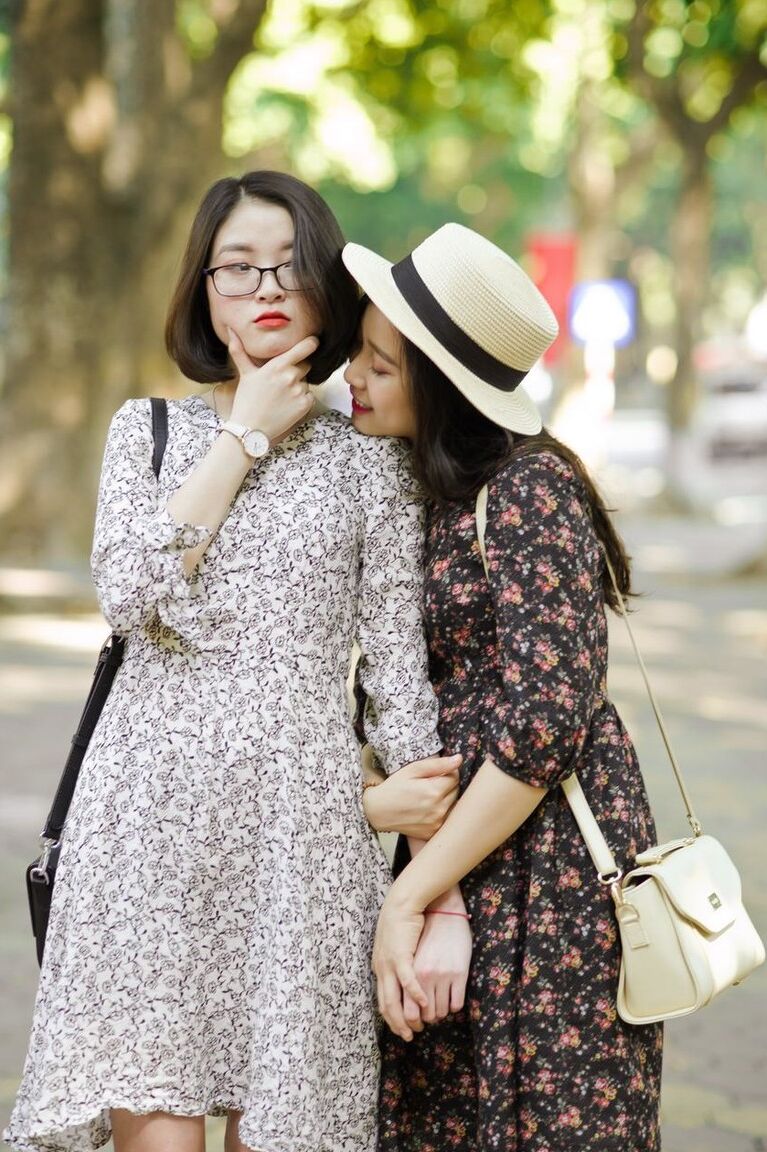 20P Gorgeous Asian brunette girls posing in their summer dresses in public