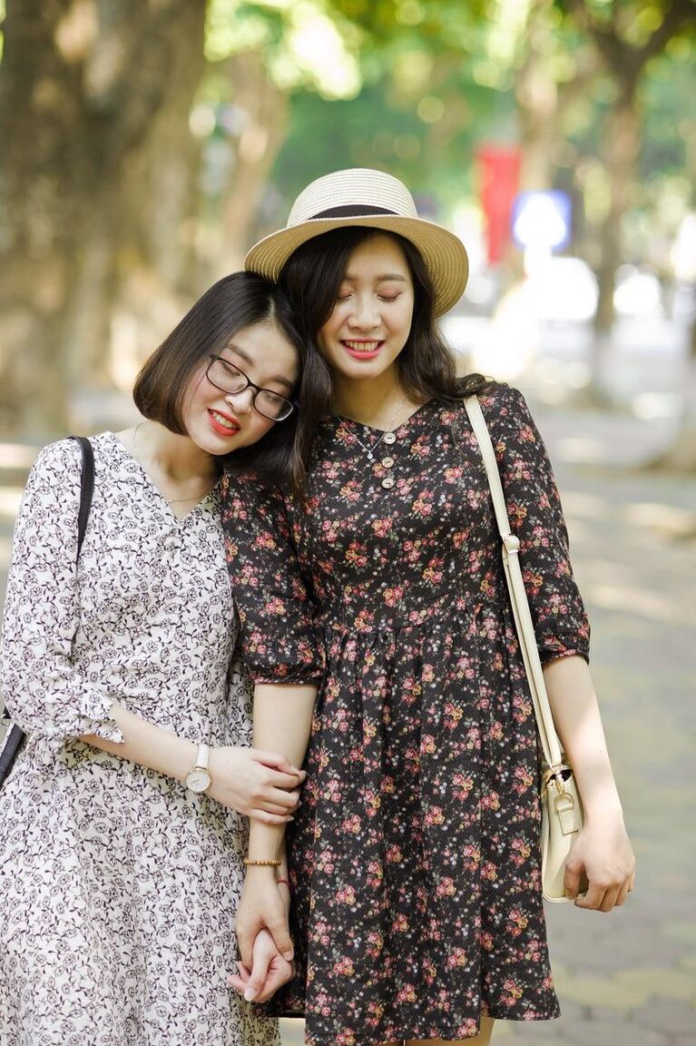 20P Gorgeous Asian brunette girls posing in their summer dresses in public