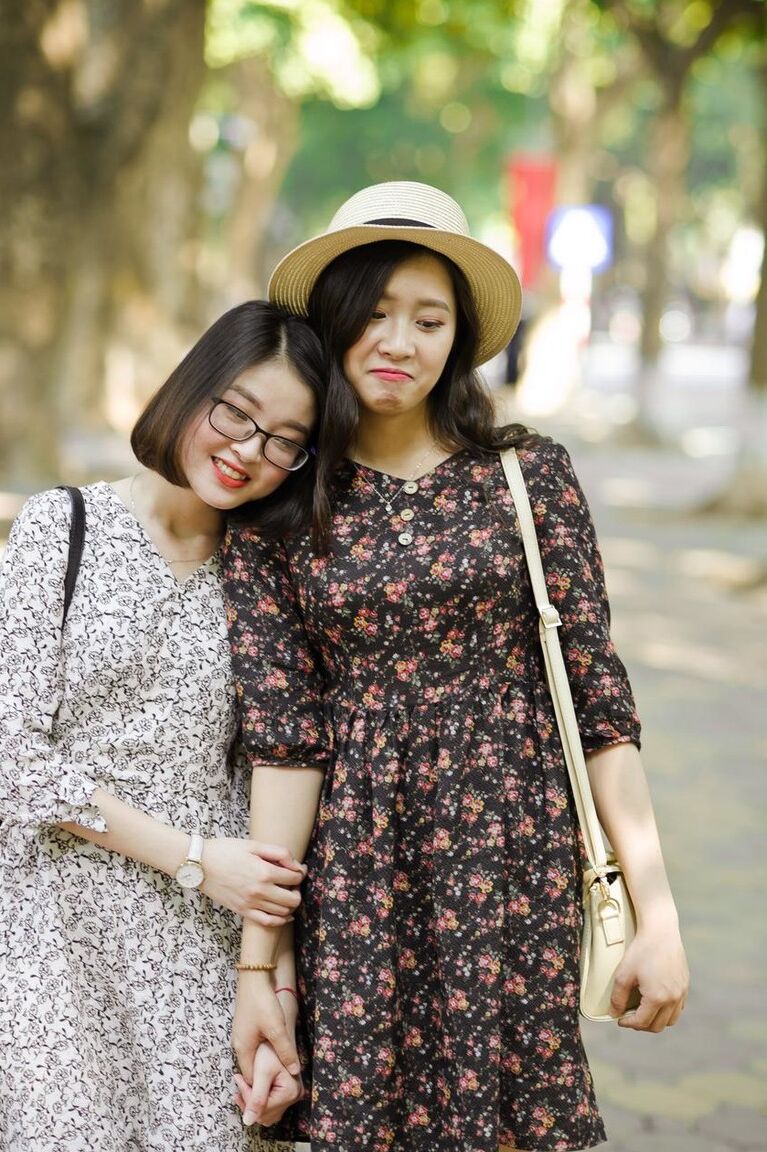 20P Gorgeous Asian brunette girls posing in their summer dresses in public
