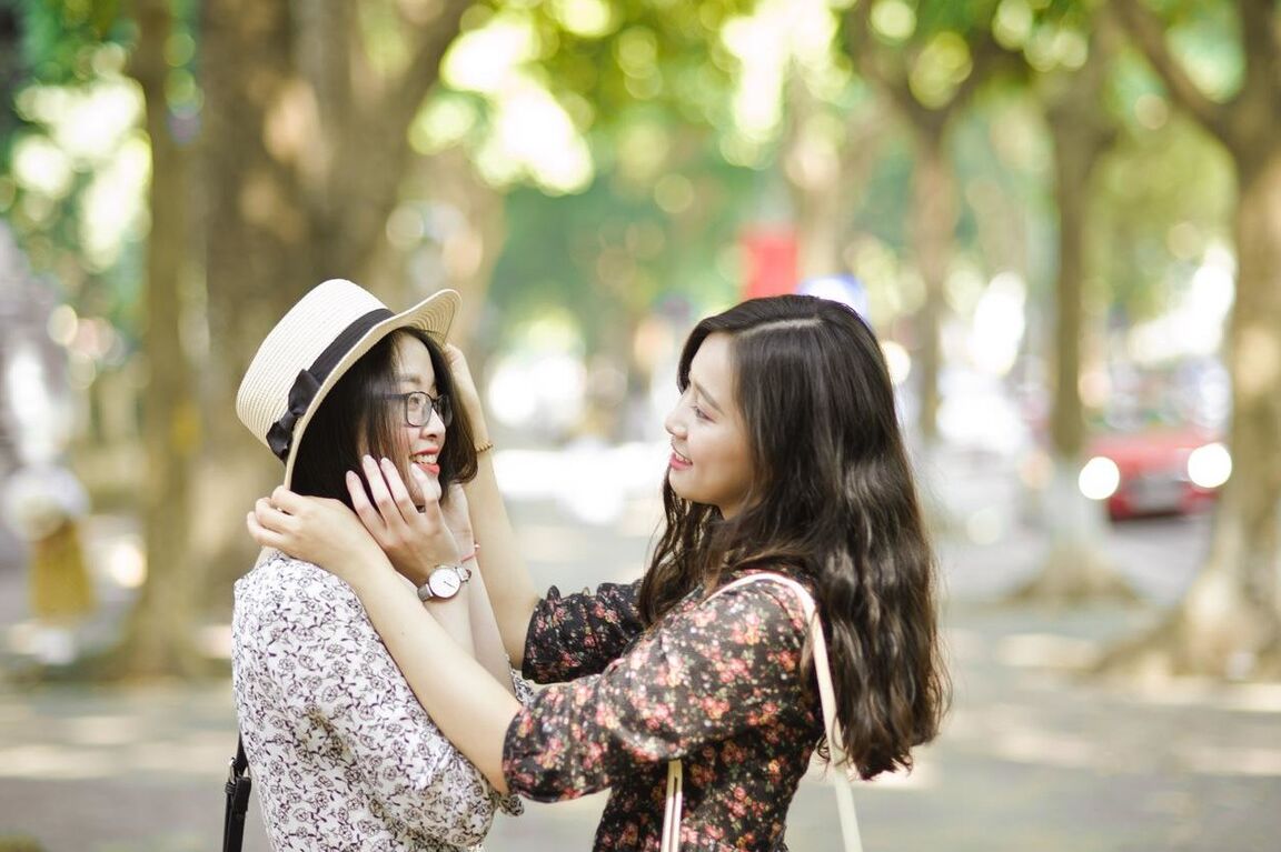 20P Gorgeous Asian brunette girls posing in their summer dresses in public