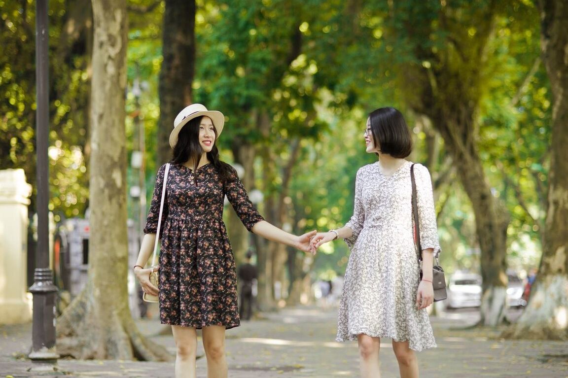 20P Gorgeous Asian brunette girls posing in their summer dresses in public