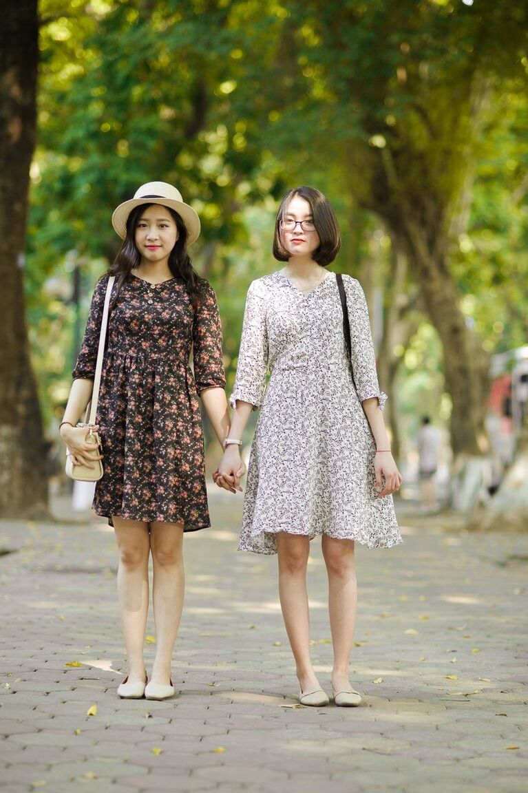 20P Gorgeous Asian brunette girls posing in their summer dresses in public