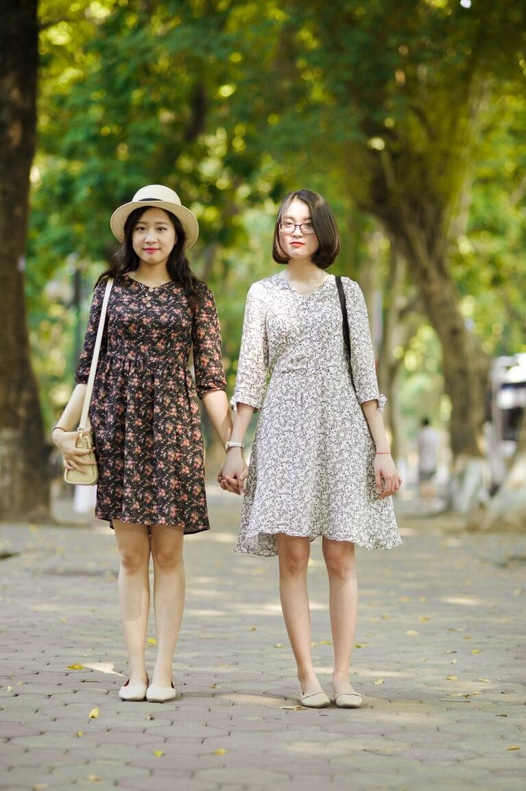20P Gorgeous Asian brunette girls posing in their summer dresses in public
