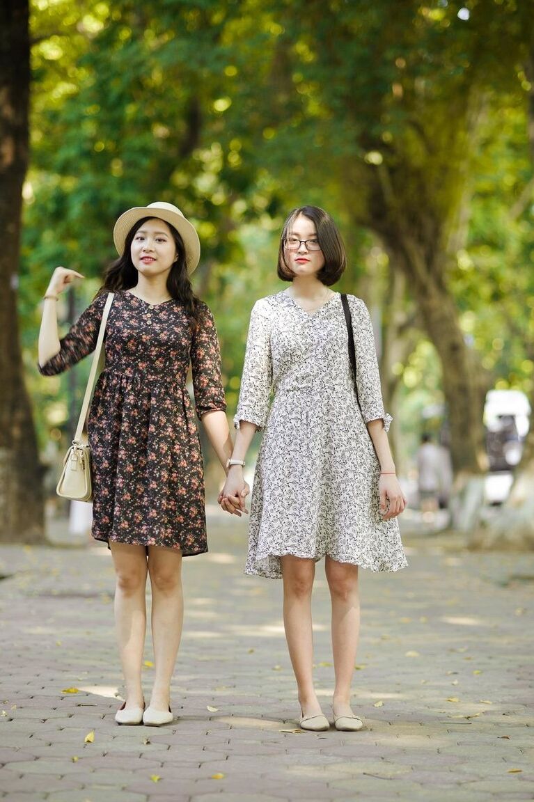 20P Gorgeous Asian brunette girls posing in their summer dresses in public