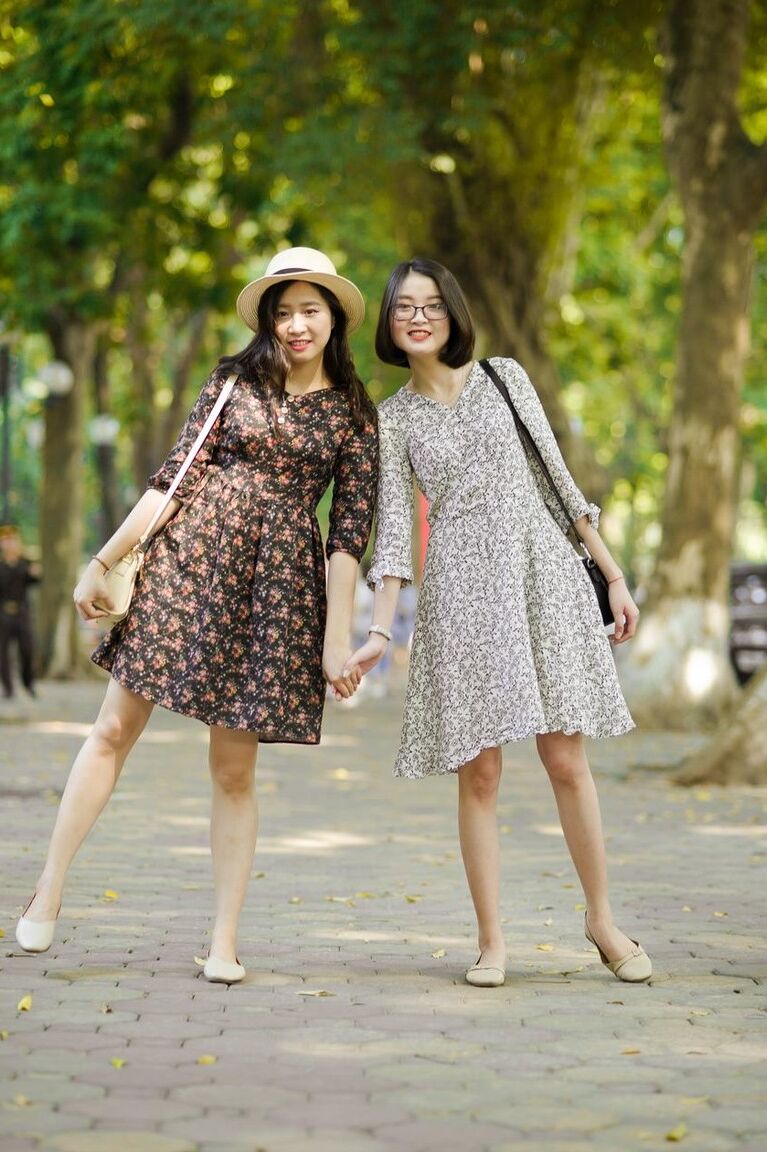 20P Gorgeous Asian brunette girls posing in their summer dresses in public
