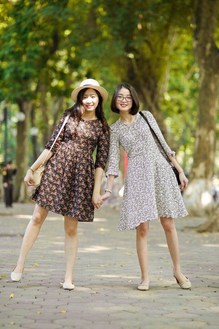 20P Gorgeous Asian brunette girls posing in their summer dresses in public