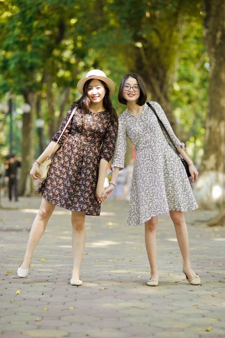 20P Gorgeous Asian brunette girls posing in their summer dresses in public