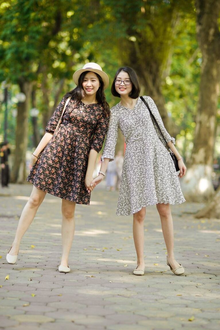 20P Gorgeous Asian brunette girls posing in their summer dresses in public