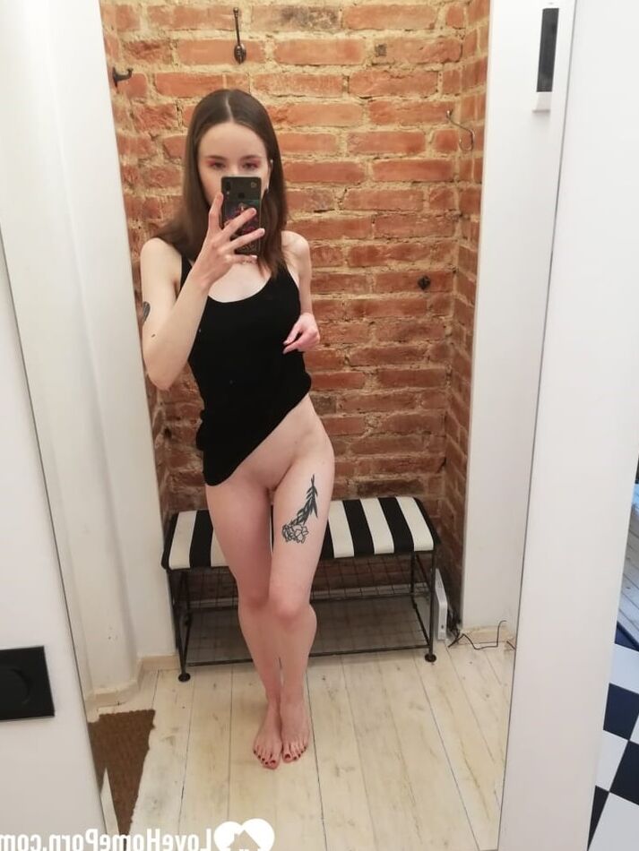 20 Pics Short brunette takes selfies while stripping & posing sexily in the mirror