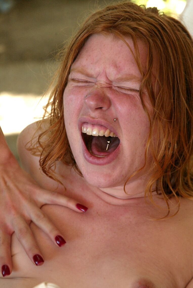 20 Pics Redhead Madison Young masturbates with a vibrator in a BDSM threesome
