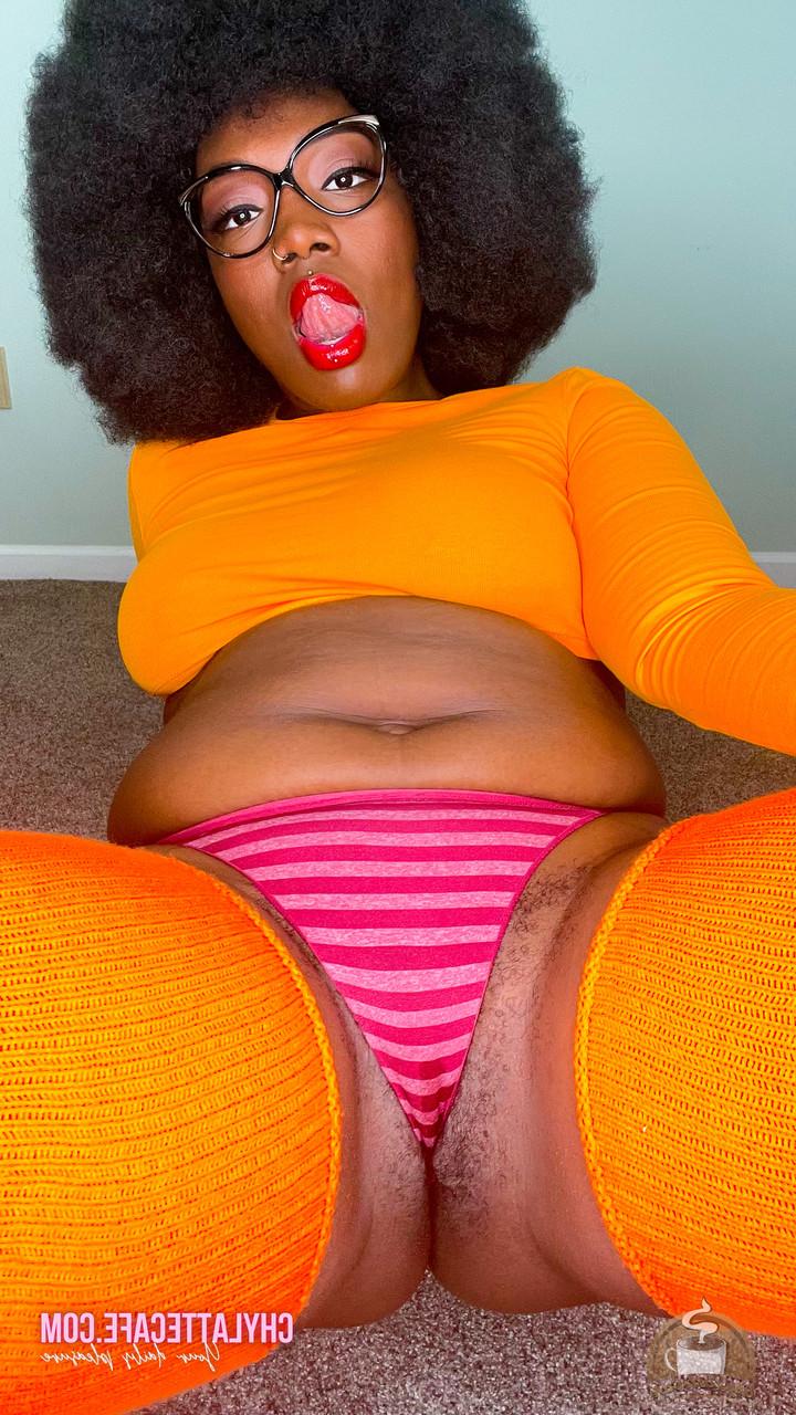 15P Hot ebony babe with an afro Chy Latte presents her big tits and tasty hole
